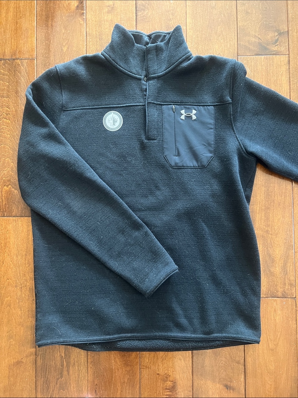 Winnipeg Jets Under Armour Black Half-Zip Fleece Pullover with Chest Pocket